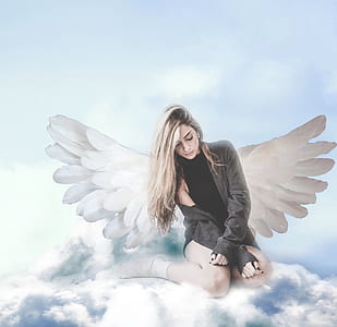 woman with wing sitting on clouds thumbnail