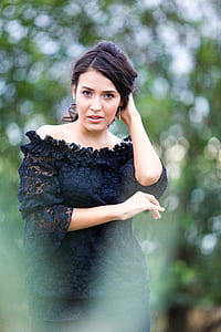 woman in black lace off-shoulder dress thumbnail