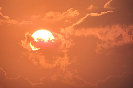 clouds and sun at golden hour thumbnail