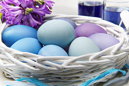 Easter eggs on white basket thumbnail