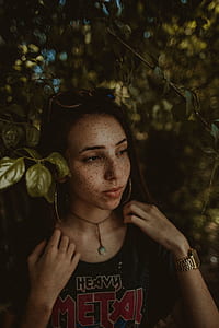 woman holding her shirts thumbnail