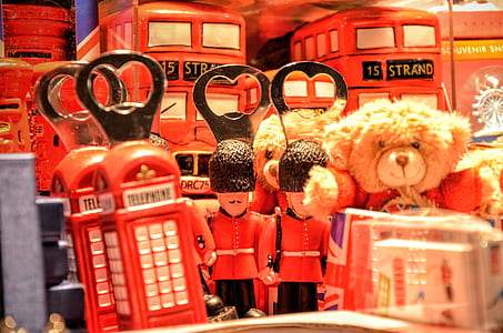 Brown Teddy Bear Near Red Miniature Telephone Booth thumbnail