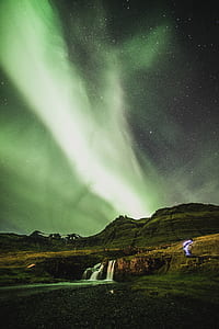 photo of aurora borealis during starry night time thumbnail