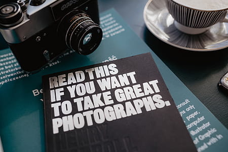Old analog camera and photography book thumbnail