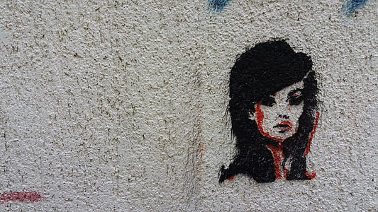 black haired woman painting thumbnail