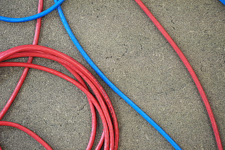red and blue hoses on ground thumbnail