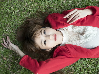 woman in brown lace top and red cardigan thumbnail