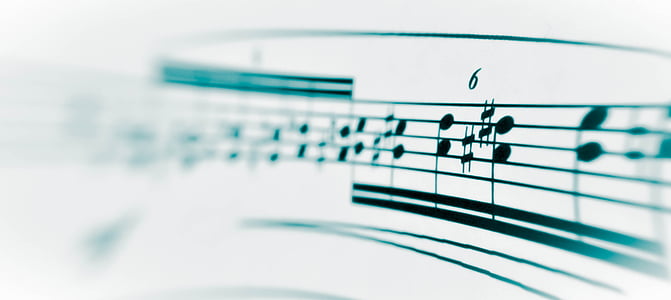 selective focus photography of music notes thumbnail