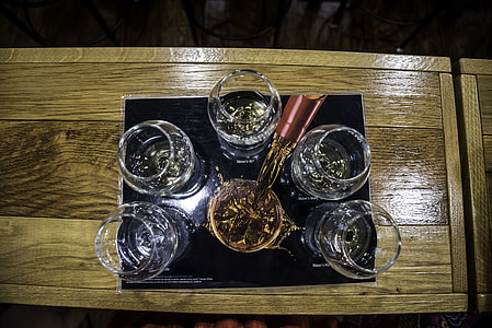Pouring Whiskey into glasses at Maker's Mark thumbnail