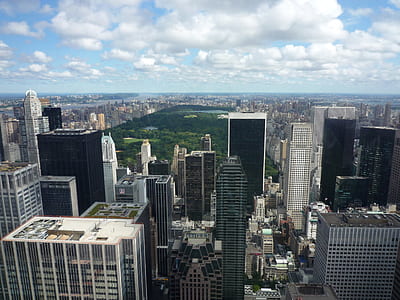 aerial view of city buildings during daytime thumbnail