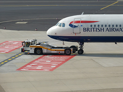 white and blue British Airway airliner at runway thumbnail