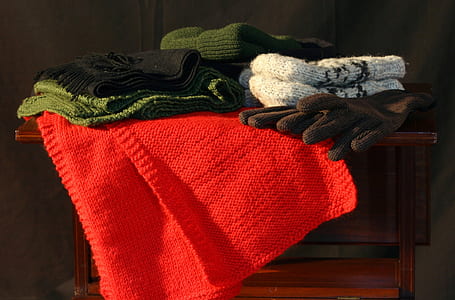 assorted colored textile on brown desk thumbnail