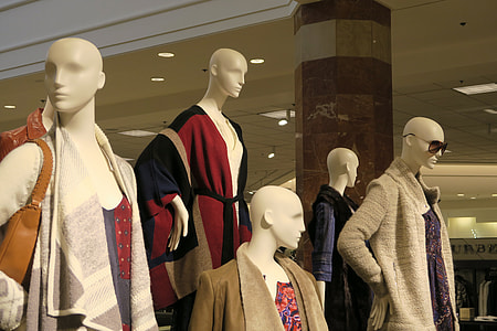 five female mannequin wearing tops thumbnail