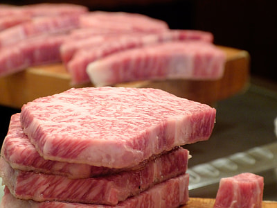 pile of sliced raw meat thumbnail
