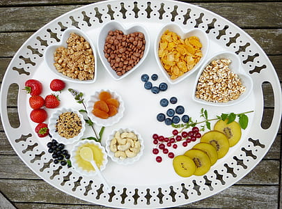 white ceramic plates with nuts thumbnail