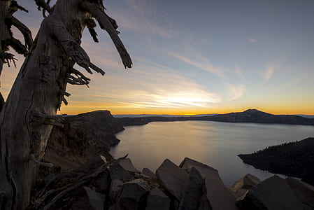 person taking photo of sunrise thumbnail