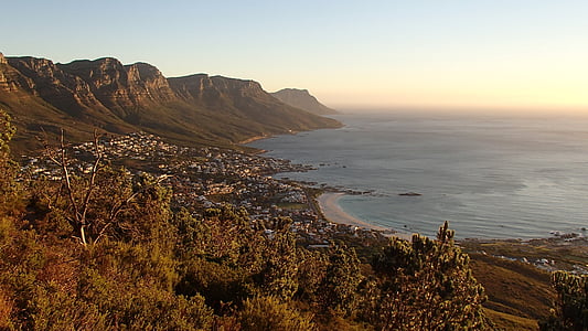 mountains near ocean thumbnail