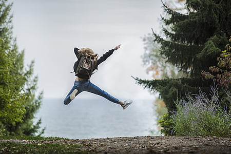 woman wearing blue jeans jumped thumbnail