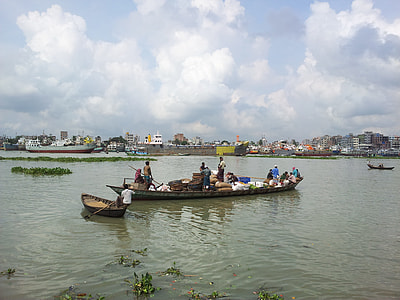 several persons riding boat on lake during daytime thumbnail