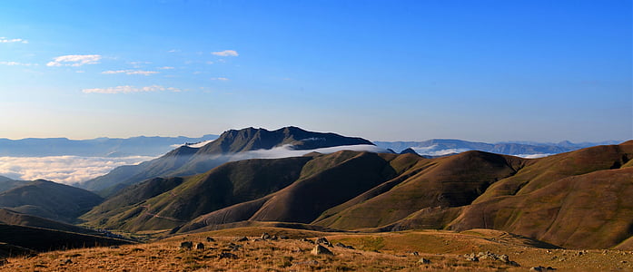 brown mountains during daytime thumbnail