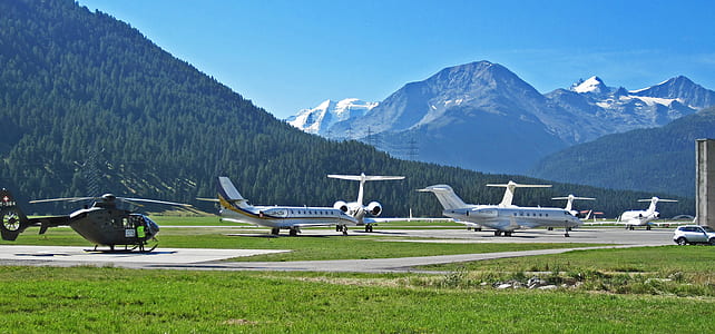 plane parked on field thumbnail