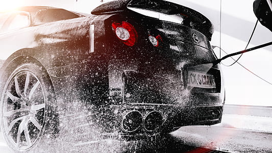 time-lapse photography of splashing water on vehicle thumbnail