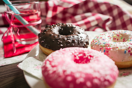 Three Yummy Sweet Colorful Donuts thumbnail