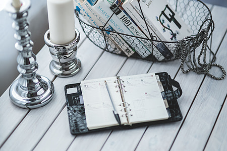 Black smartphone and headphones with various items thumbnail