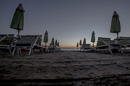 sunloungers near body of water thumbnail