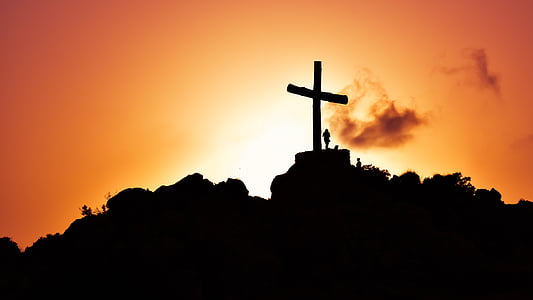 silhouette photo of cross on mountain thumbnail
