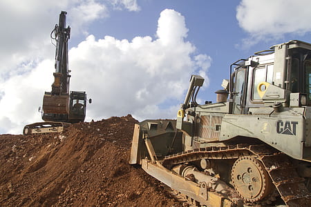 gray heavy equipment on brown sands thumbnail