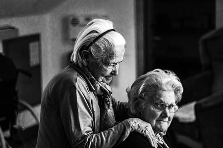 person holding the shoulder of woman thumbnail