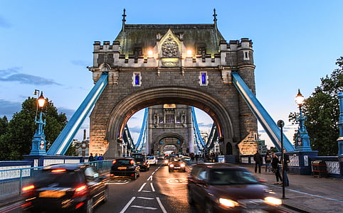 vehicles passing under Tower Bridge London thumbnail