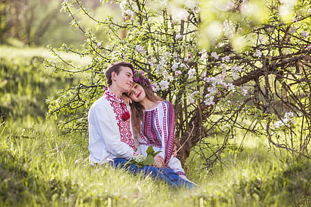 man and woman surrounded with plants during daytime thumbnail