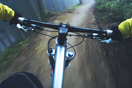 A man exercising on a mountain bicycle thumbnail