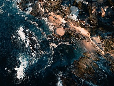 aerial photography of houses at the beach during day thumbnail