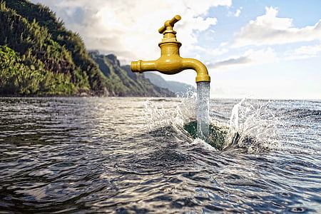 brass faucet and body of water thumbnail