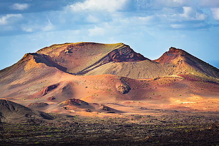 sandy mountain under white skies during daytime thumbnail