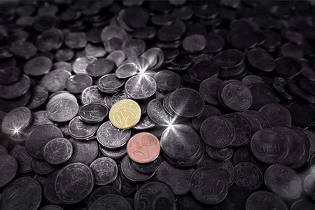 selective focus photography of assorted-denomination Indian coins thumbnail