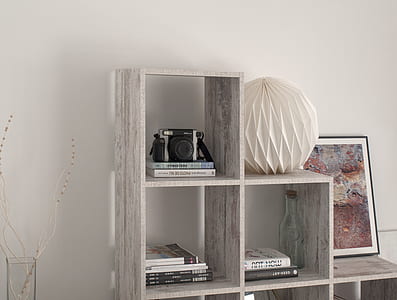 closeup photo of gray wooden cubby shelf thumbnail