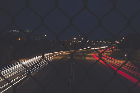 timelapse photography of vehicle lights on road thumbnail
