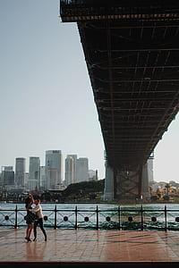 man and woman under bridge thumbnail
