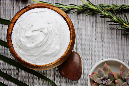 white cream on brown bowl thumbnail