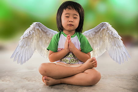 winged girl wearing white and green raglan crew-neck t-shirt praying thumbnail