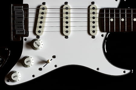 closeup photography of electric guitar thumbnail