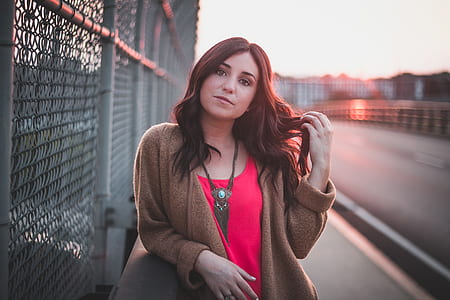 woman wearing a brown cardigan thumbnail