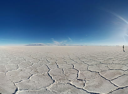 silhouette of person stepping on ground during daytime thumbnail