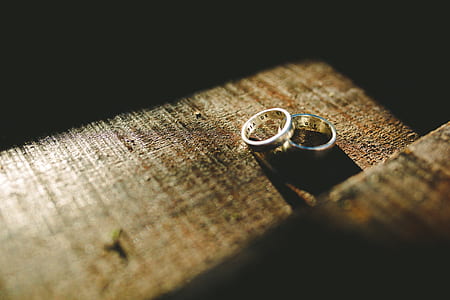 two gold-colored rings thumbnail