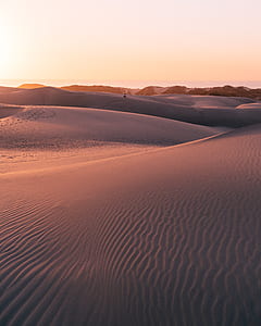 dessert area under gray sky thumbnail