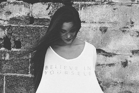 grayscale photo of woman looking down thumbnail